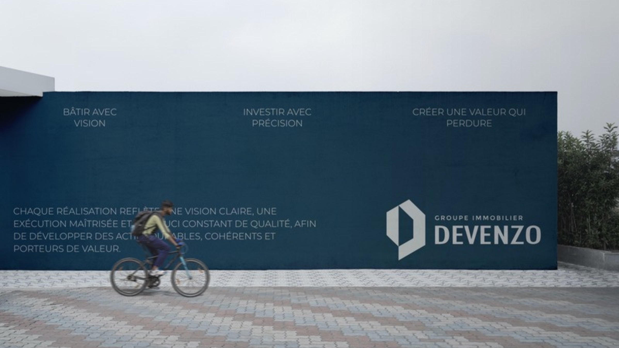 Palissade de chantier Devenzo, branding immobilier par Eve Marketing